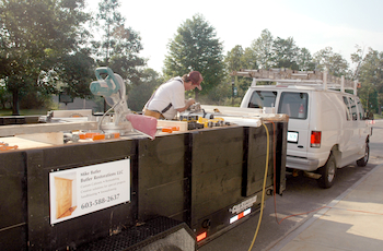 carpenter working on trailer